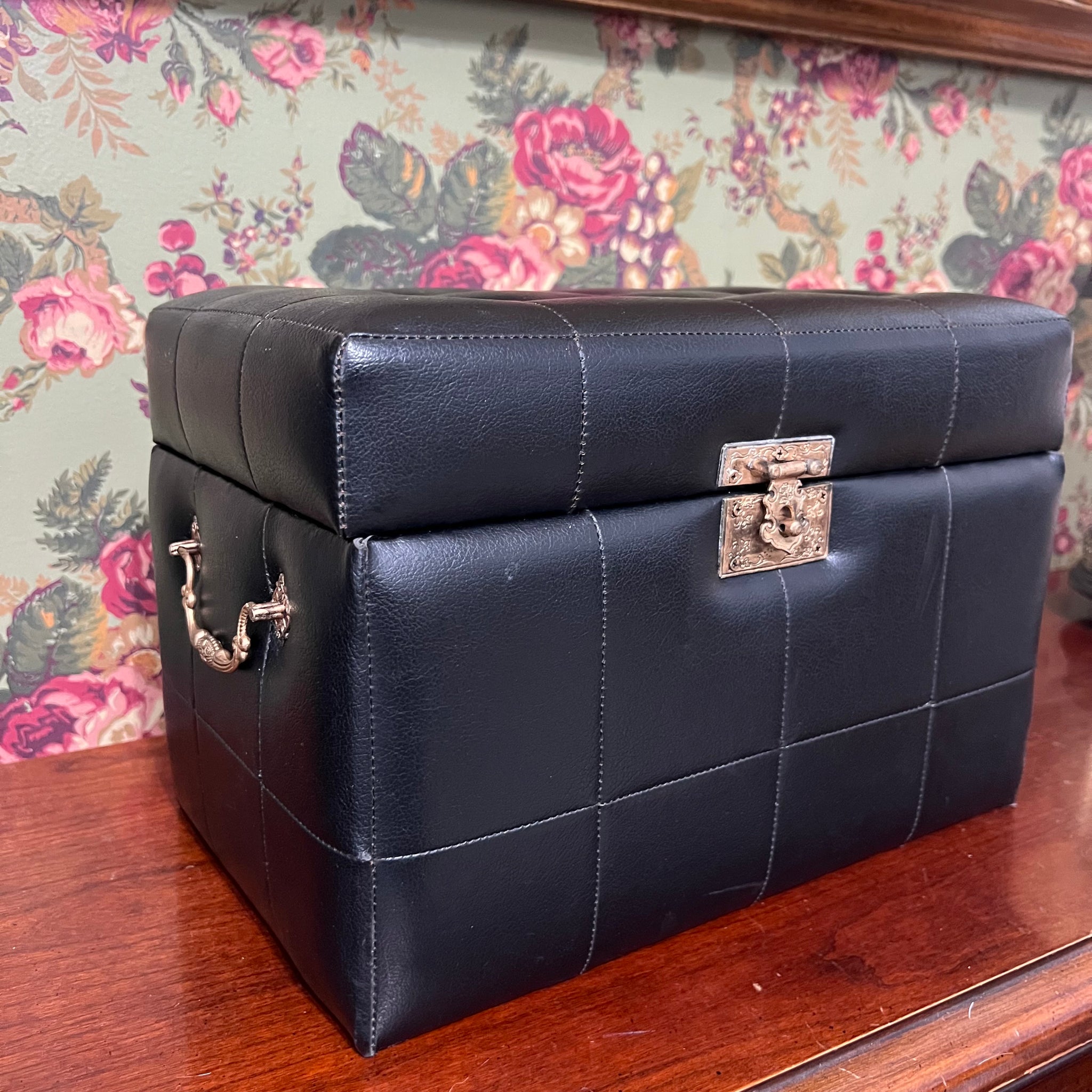 Vintage faux black leather tufted storage trunk