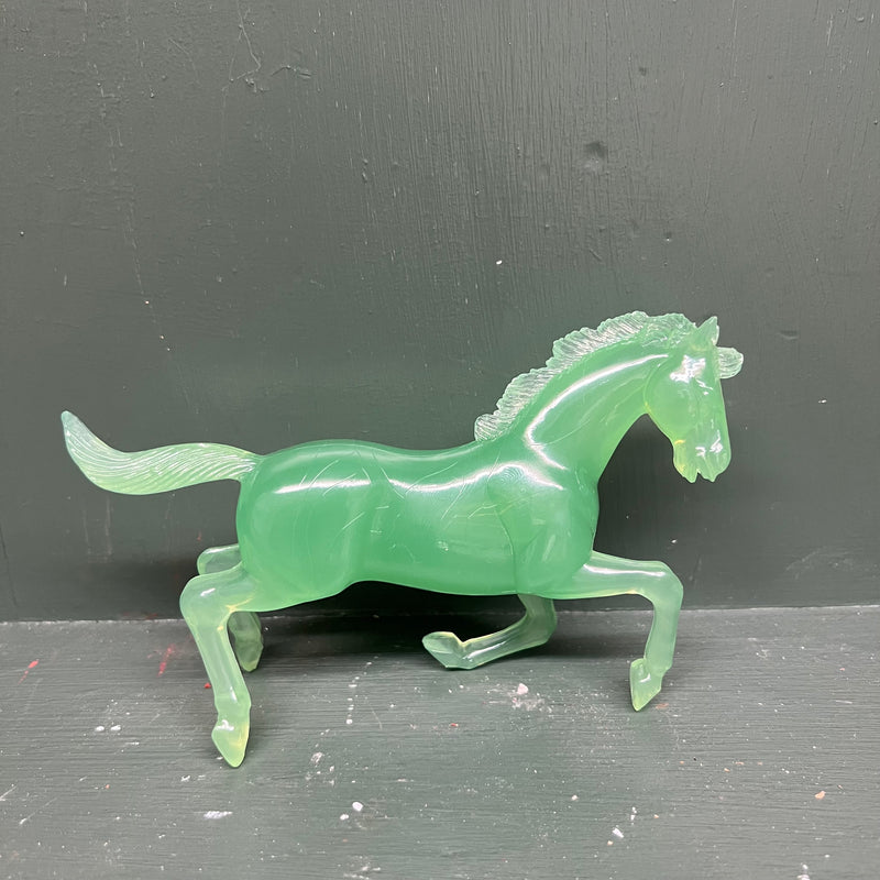 Green lucite horse figure