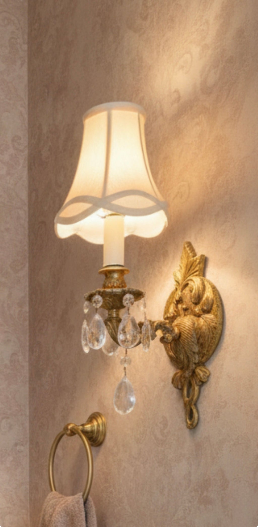 European Rococo Revival brass sconce with crystal drops