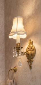 European Rococo Revival brass sconce with crystal drops